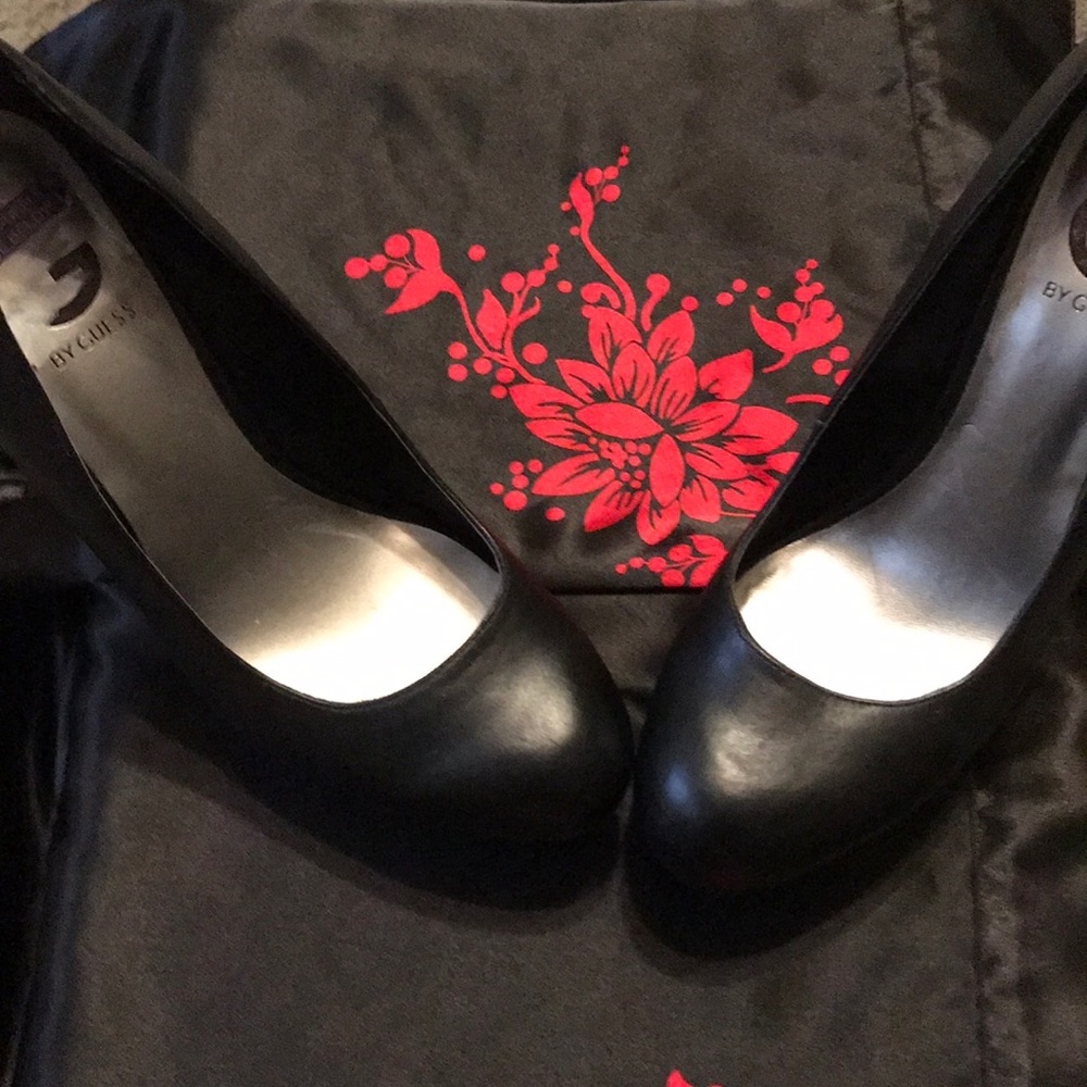 Black platform pumps